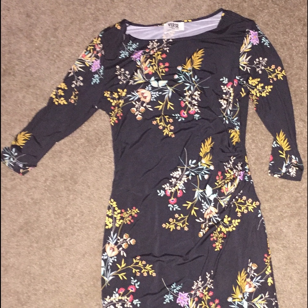 Verse black mid length dress with a slit